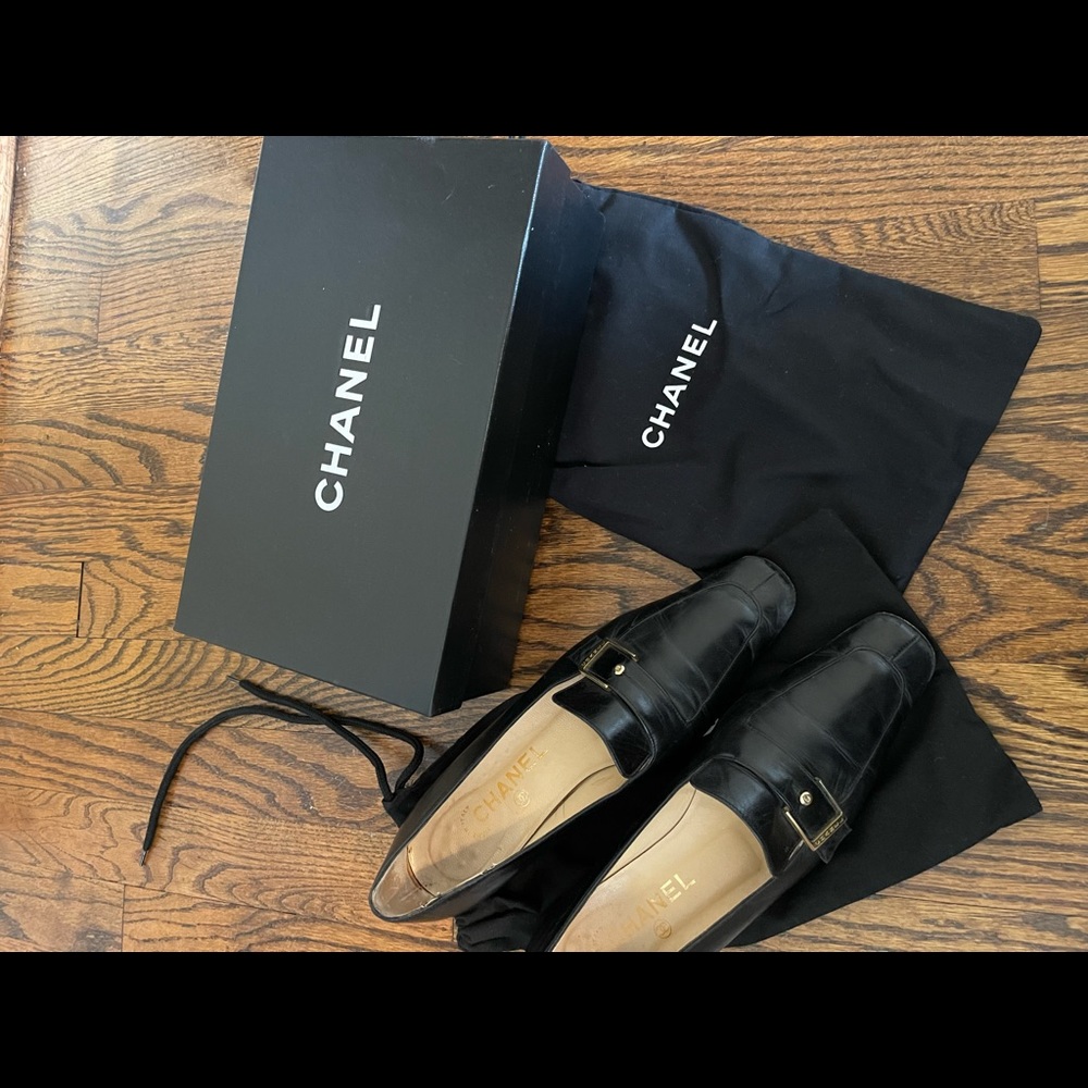 Black leather Chanel shoes; authenticity guaranteed